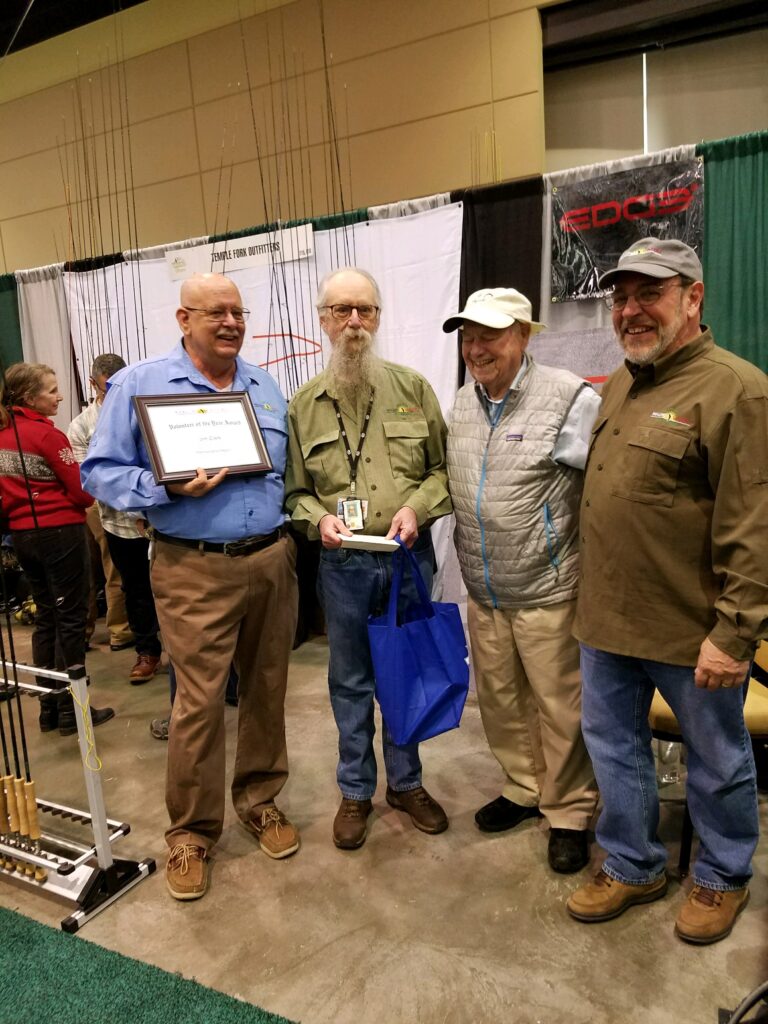 Jim Clark being presented with the “2016 Volunteer of the Year Award” for the PA Region. Pictured are Skip Hughes, Jim Clark, Lefty Kreh, and Tom Herr