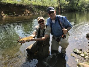 Guide Ira Strouse and CPL (ret) Jim Graham, U.S. Army with a huge Rose River brook trout 