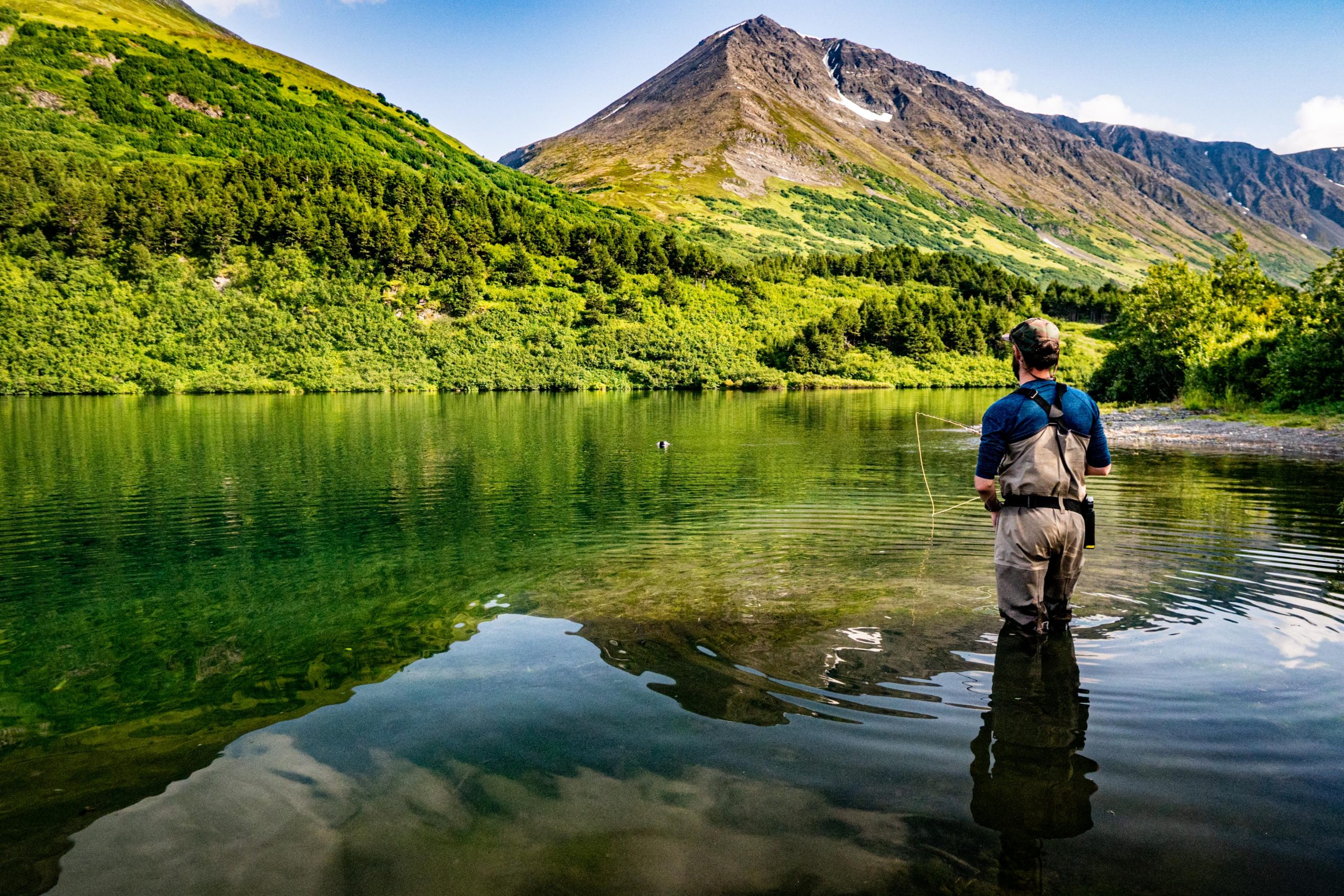Fly fishing an Alaskan lake.