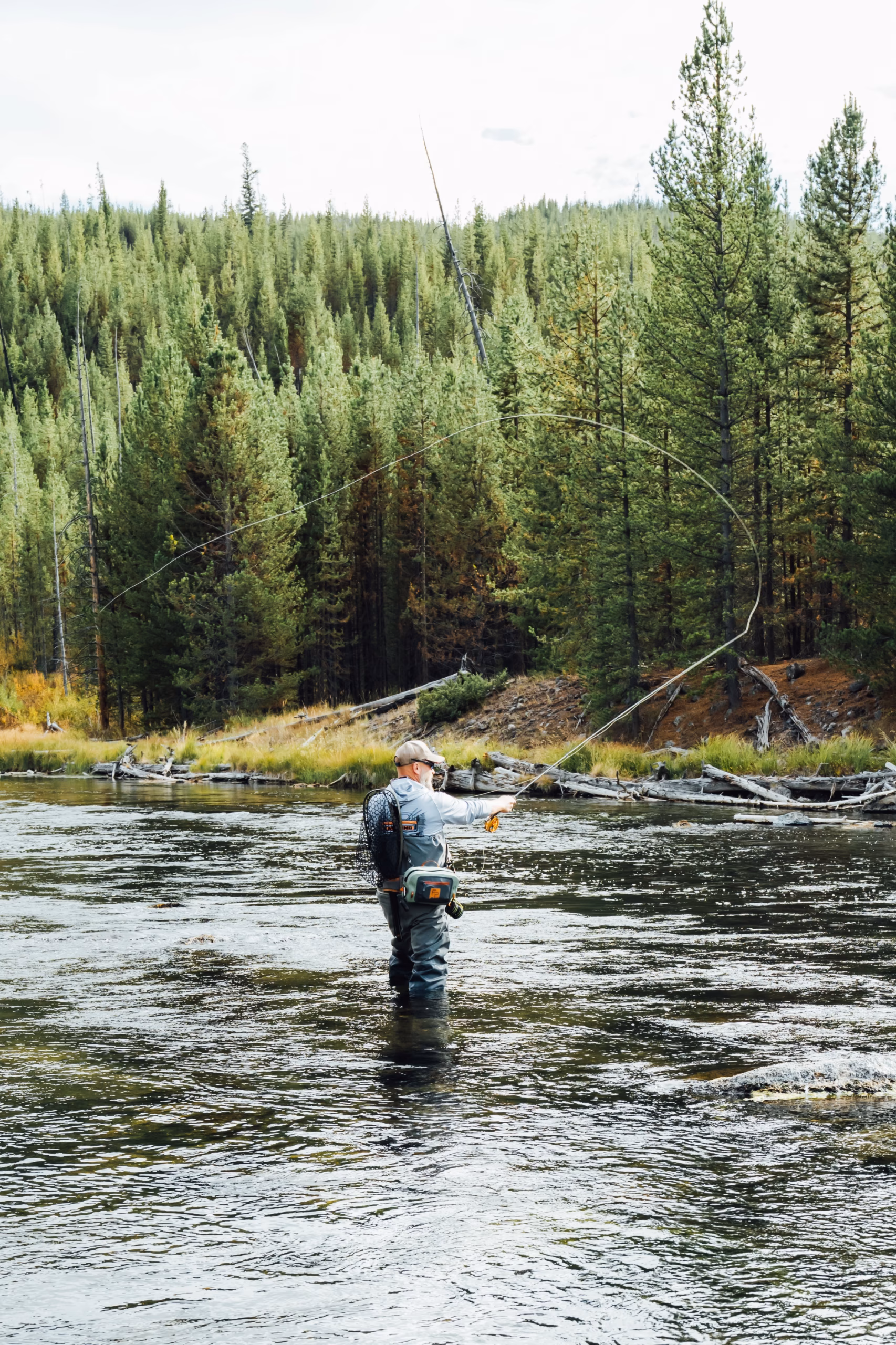 Fisherman in a river